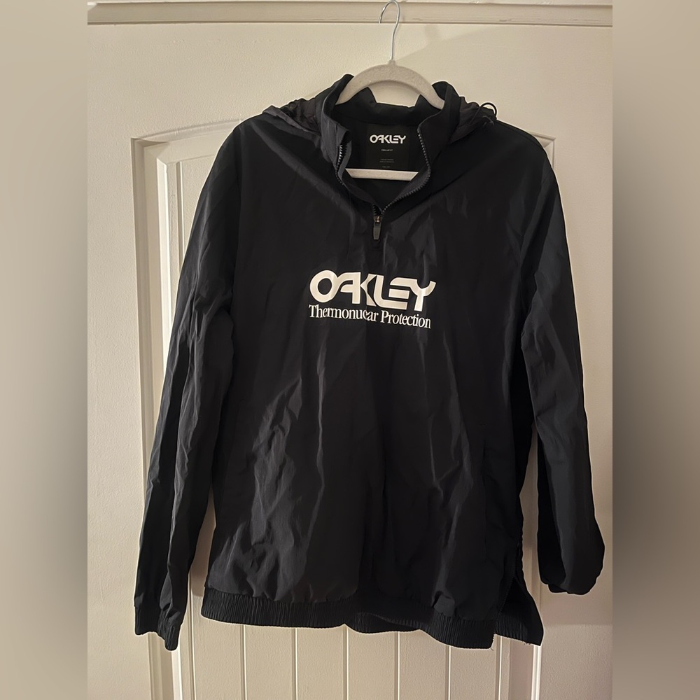 Oakley quarter zip with center pocket